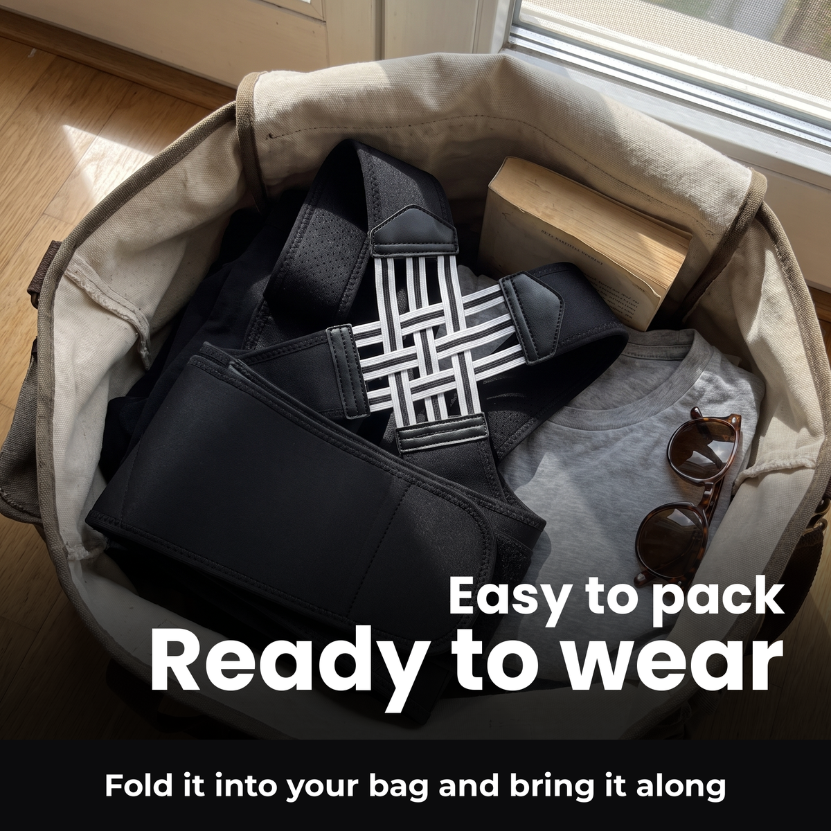 Folded Voria SpineArmor in a weekender bag